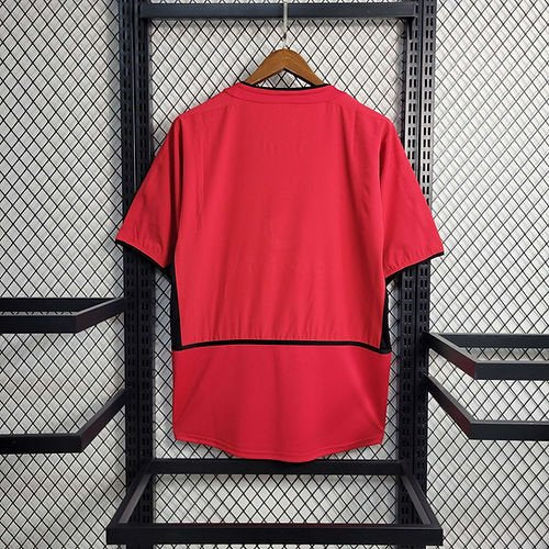 Camiseta local del Manchester United 2002